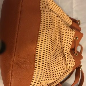 Tan colored  long strap hobo bag